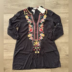 Embroidered top; fits large brand new with tag